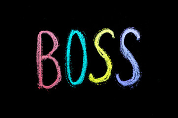 word "boss" hand drawn on blackboard