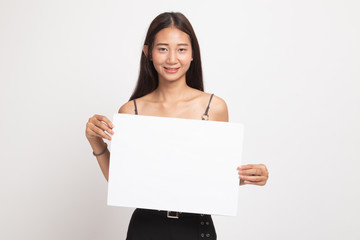 Naklejka premium Young Asian woman with white blank sign.