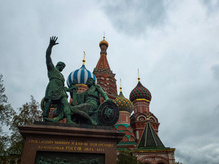 Fototapeta na wymiar Moscow, Russia - May 2, 2019. Minin and Pozharskiy monument and St.Basil's Cathedral