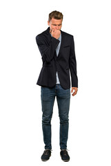 Blonde handsome man having doubts