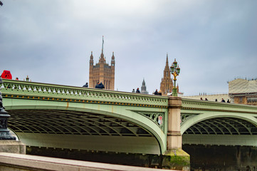 Fototapeta na wymiar Thames river and big ben parliament building with westminster bridge