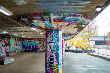 Graffiti art center on south bank at river thames