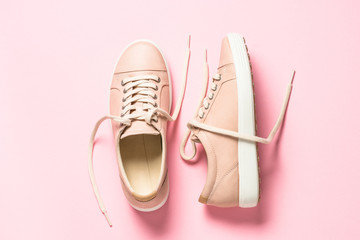 Pink shoes on pink top view.