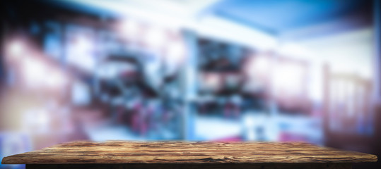 Table background of free space for your decoration and blurred bar. Night Club interior. 