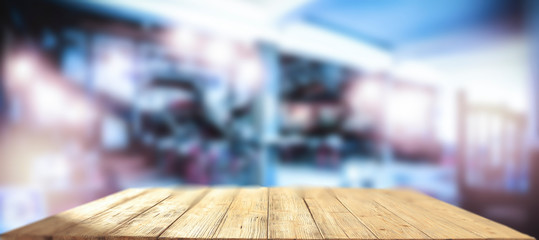 Table background of free space for your decoration and blurred bar. Night Club interior. 