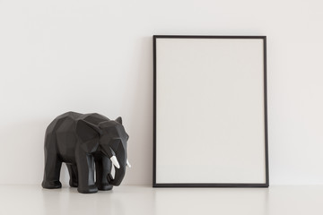 Home decor geometric elephant and poster frame mockup.