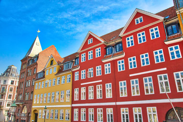 Fototapeta premium Famous Nyhavn (New Harbour) bay in Copenhagen, a historic 17 century European waterfront with colorful buildings. A starting point for boat and canal tours.