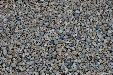 beautiful unusual background of small stones close up 