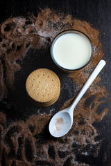 COOKIES AND MILK WITH SUGAR AND COCOA FOR BREAKFAST 