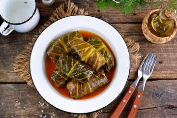 Cabbage leaves stuffed with rice, minced meat in tomato sauce.