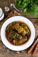 Cabbage leaves stuffed with rice, minced meat in tomato sauce.