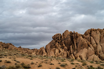 Fototapeta na wymiar California desert landscape overcast sky above rock formations of the Alabama Hills in the Sierra Nevada