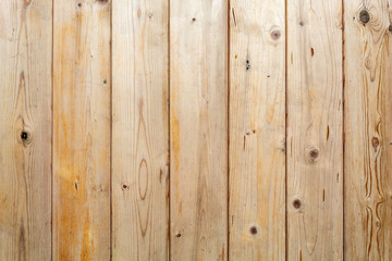 Fototapeta na wymiar Brownish Used Vertical Wooden Panels