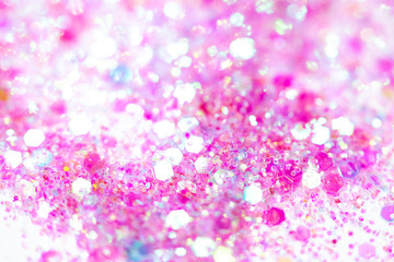 Pink Sparkling Glitter on White Background Bokeh Abstract Close Up