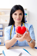 Female doctor cardiologist working in the clinic