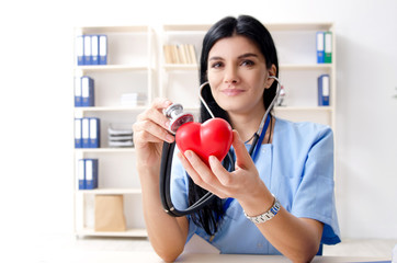 Female doctor cardiologist working in the clinic