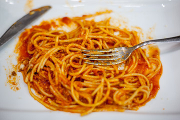 Tasty appetizing pasta spaghetti with tomato sauce and parmesan