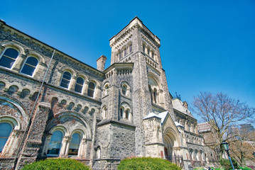 Fototapeta na wymiar Old Toronto University Campus and buildings located in city downtown area
