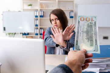 Beautiful female employee unhappy with excessive work 