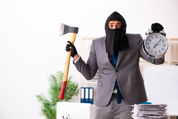 Male gangster stealing information from the office 