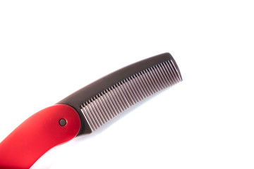 白い背景とクシの写真