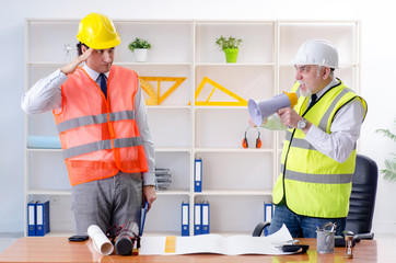 Two engineers colleagues working under project 