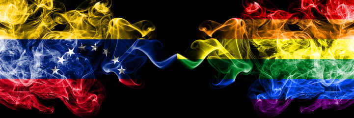 Obraz premium Venezuela vs Gay pride smoky mystic flags placed side by side. Thick colored silky smoke flags of Venezuela and Gay pride