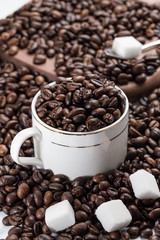 Coffee beans and sugar cubes