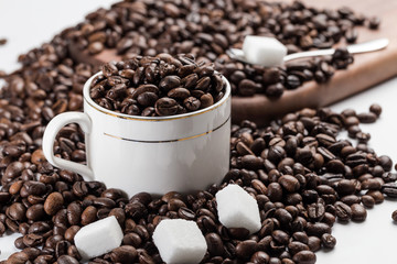 Coffee beans and sugar cubes