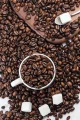 Coffee beans and sugar cubes