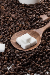 Coffee beans and sugar cubes
