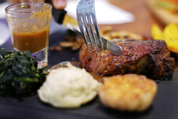 Close up of Australian Tenderloid on the table in restaurant at night party. Selective focus,.Good view of Pub & restaurant concept.