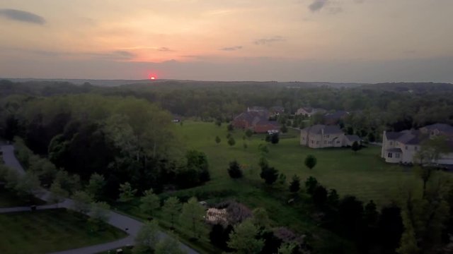Sunset aerial view of luxury American single family real estate in Columbia Maryland USA
