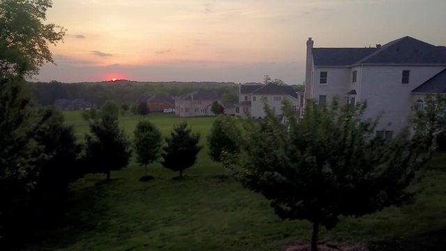 Sunset aerial view of luxury American single family real estate in Columbia Maryland USA
