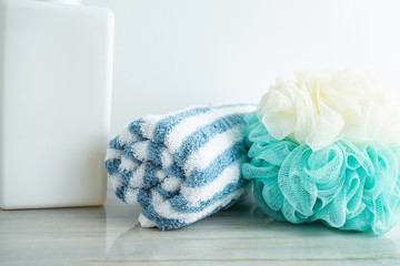 Obraz na płótnie Canvas Bathroom towel and bath ball shower gel personal care background material