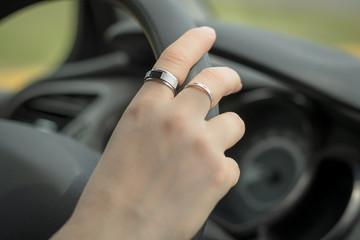 hand on  the steering wheel