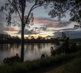 Fototapeta na wymiar River Sunset Evening Reflections