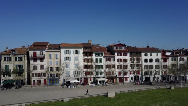 Bayonne aerial view of the medieval typical French houses along the Nive river in France on a sunny day with blue sky