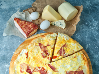 Slice of hot pizza large cheese lunch or dinner crust seafood meat topping sauce. with bell pepper...