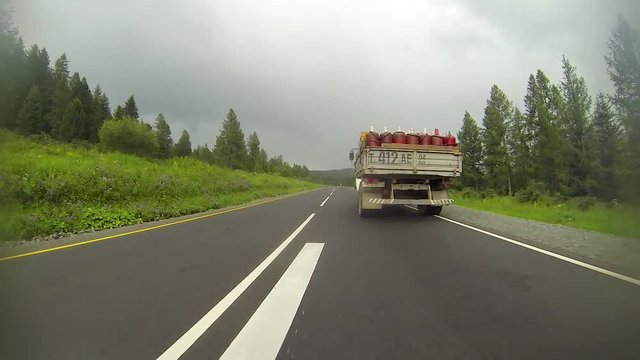 Overtaking a truck on a mountain road