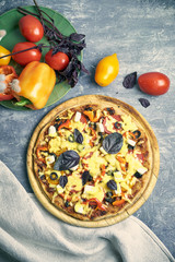 Slice of hot pizza large cheese lunch or dinner crust seafood meat topping sauce. with bell pepper vegetables delicious tasty fast food italian traditional on wooden board table classic in view
