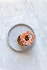 Finnish traditional Vappu food 1st of May, sugar donuts with sima on marble background with copy space