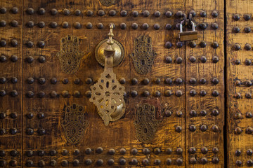 Detail of the wooden doors of Marrachesh house, Morocco