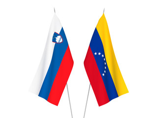 National fabric flags of Venezuela and Slovenia isolated on white background. 3d rendering illustration.