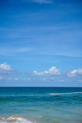 Fototapeta na wymiar Clouds blue sky and calm sea background landscape
