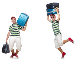 Young man with heavy suitcases isolated on white 