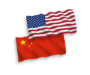 National vector fabric wave flags of China and America isolated on white background. 1 to 2 proportion.