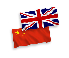 National vector fabric wave flags of China and Great Britain isolated on white background. 1 to 2 proportion.