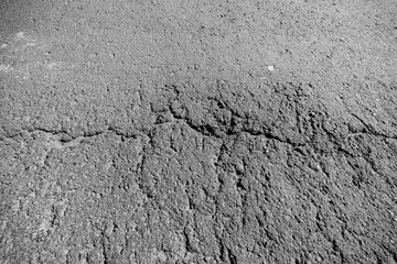 Obraz premium Crack in monochrome asphalt canvas