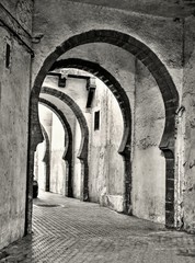 Narrow arched junction between the streets in the old part of Casablanca in Morocco